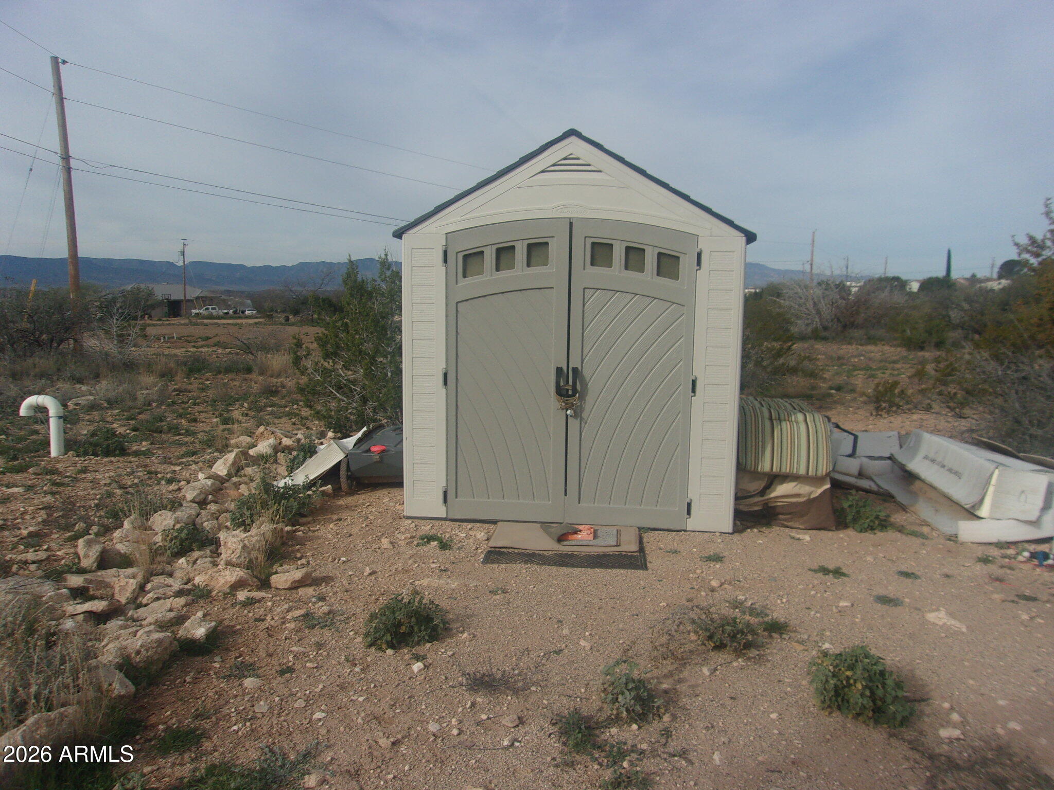 4875 Smoke Signal Way, Unit 103 Rimrock, AZ 86335 - Photo 5 of 15 a front view of a house with a yard