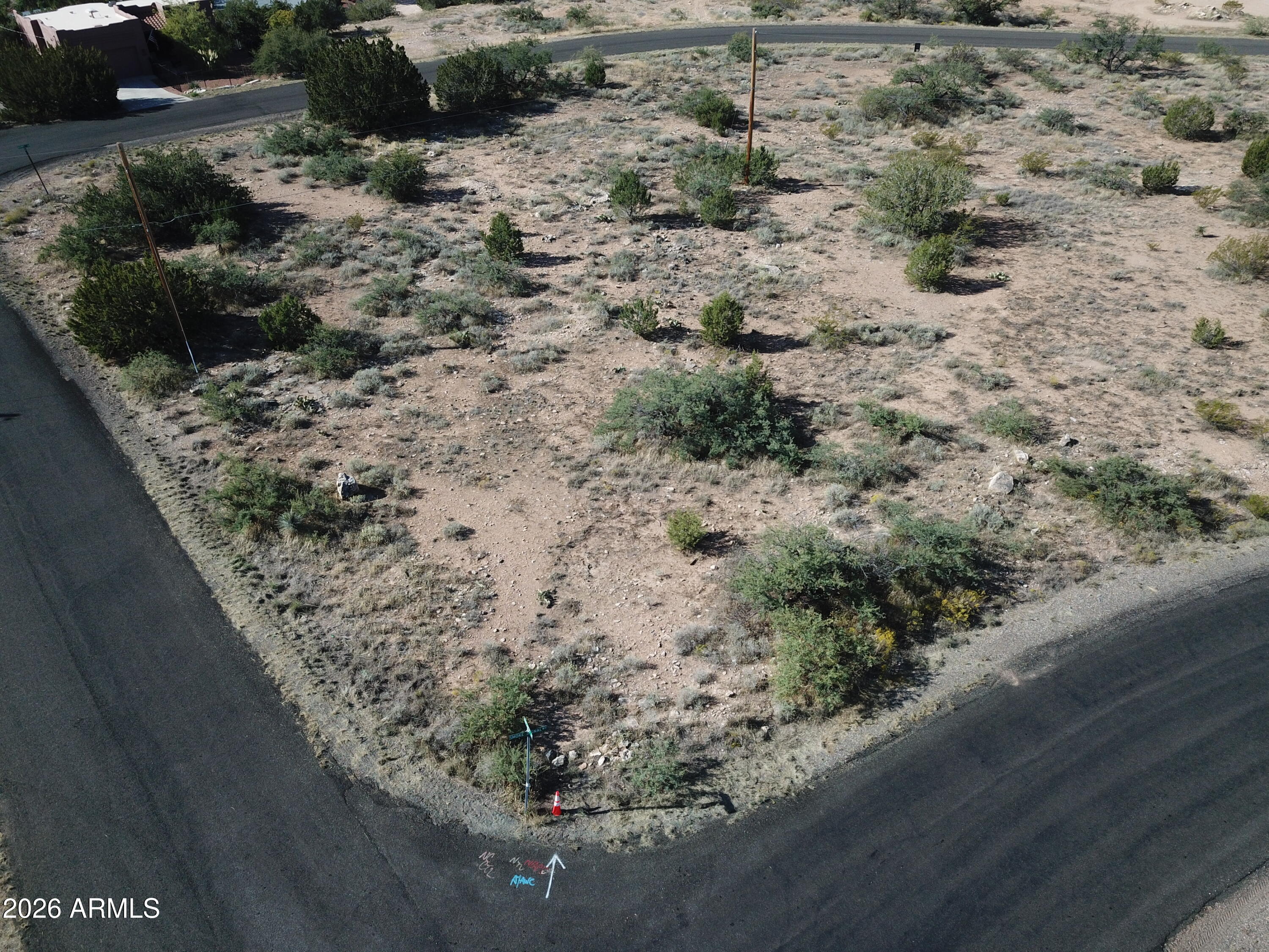 4875 Smoke Signal Way, Unit 103 Rimrock, AZ 86335 - Photo 9 of 15 a view of a dry yard with wooden fence