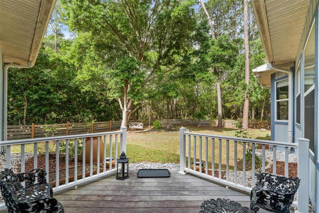 3448 Northwest 68 Road Gainesville, FL 32653 - Photo 40 of 51 a view of a balcony with wooden floor