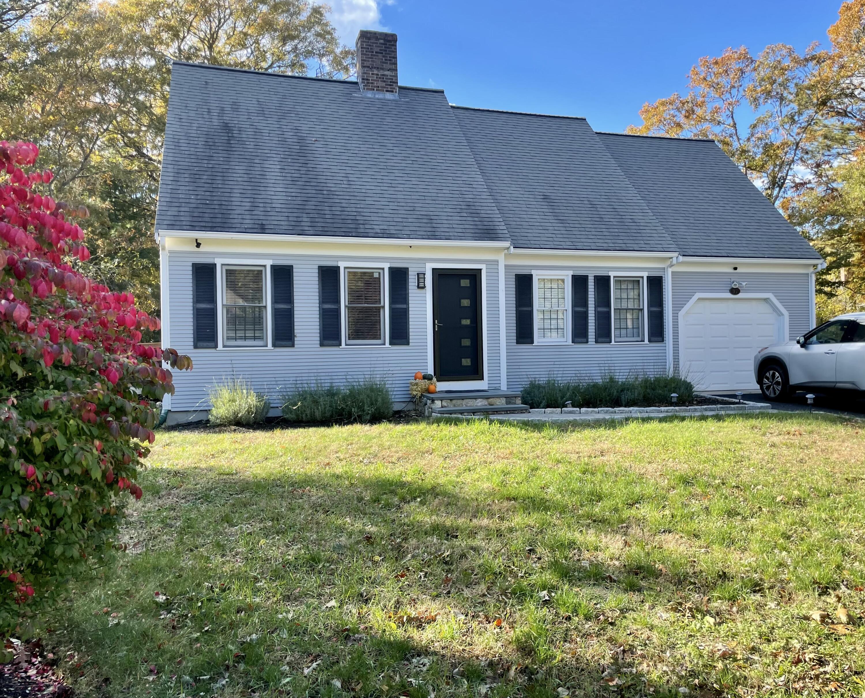 97 Braley Jenkins Road Centerville, MA 02632 - Photo 1 of 39 a view of a house with a garden