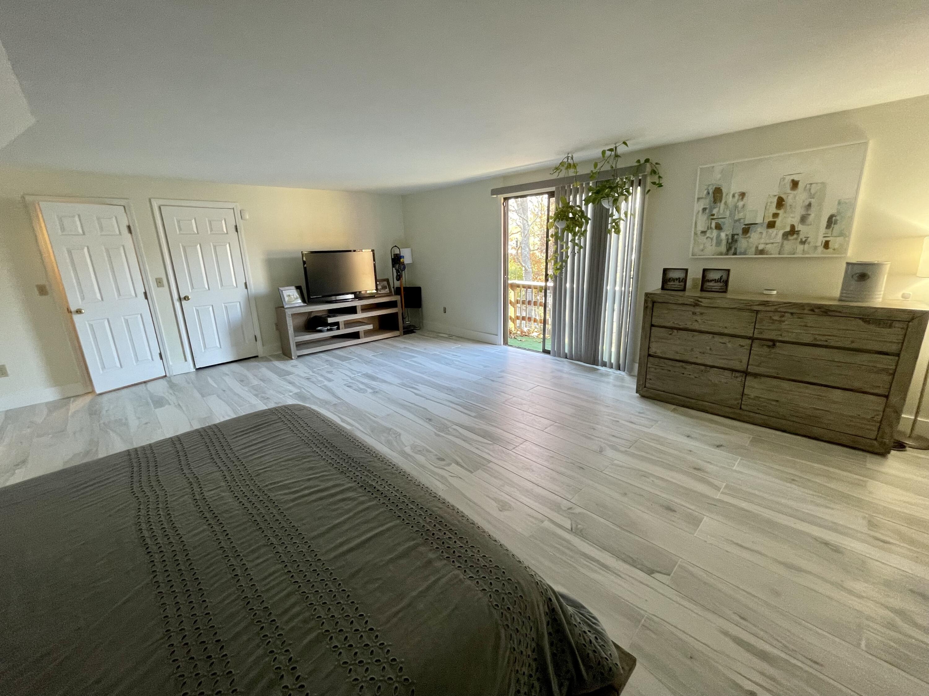 97 Braley Jenkins Road Centerville, MA 02632 - Photo 25 of 39 a bedroom with a bed and a window