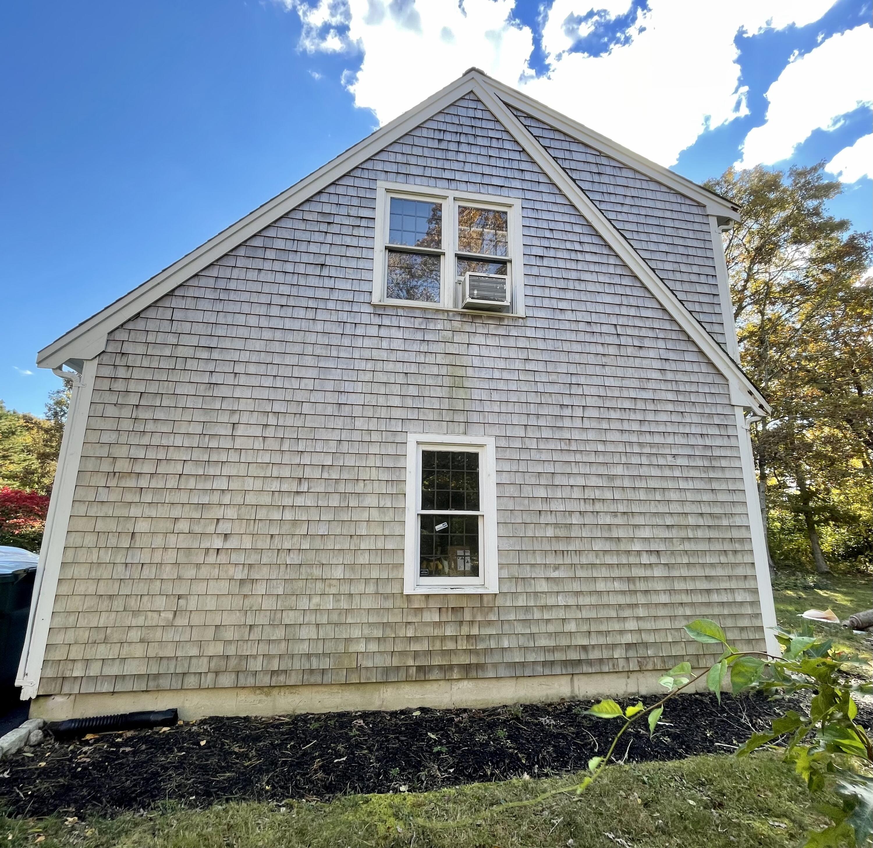 97 Braley Jenkins Road Centerville, MA 02632 - Photo 3 of 39 a front view of a house