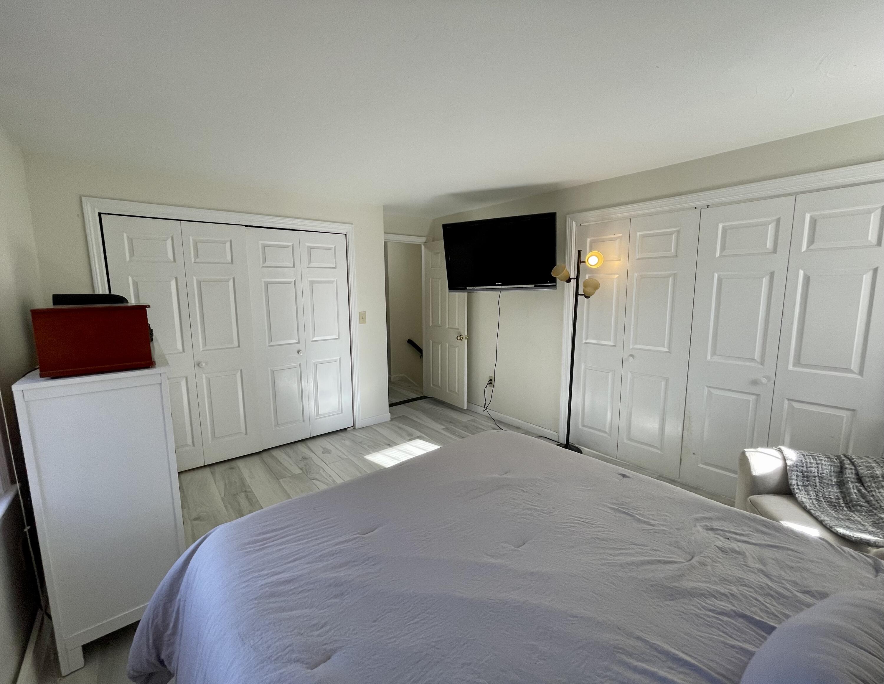 97 Braley Jenkins Road Centerville, MA 02632 - Photo 31 of 39 a bedroom with a bed and a television
