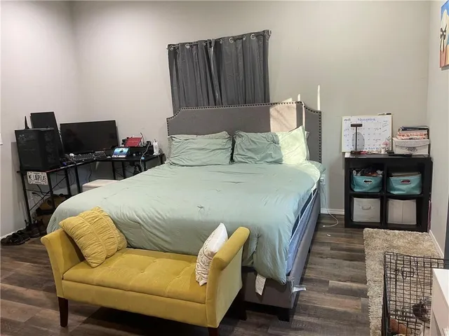 a bathroom with a toilet a sink and a mirror