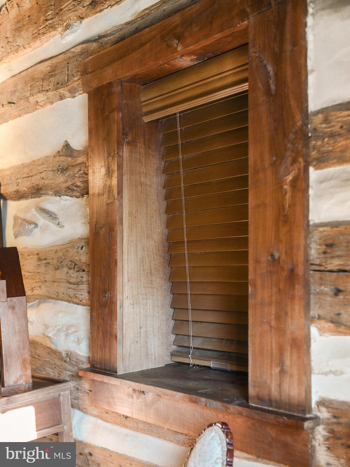 7144 Ira Sears Road Adamstown, MD 21710 - Photo 76 of 149 Thick log wall - Living Room