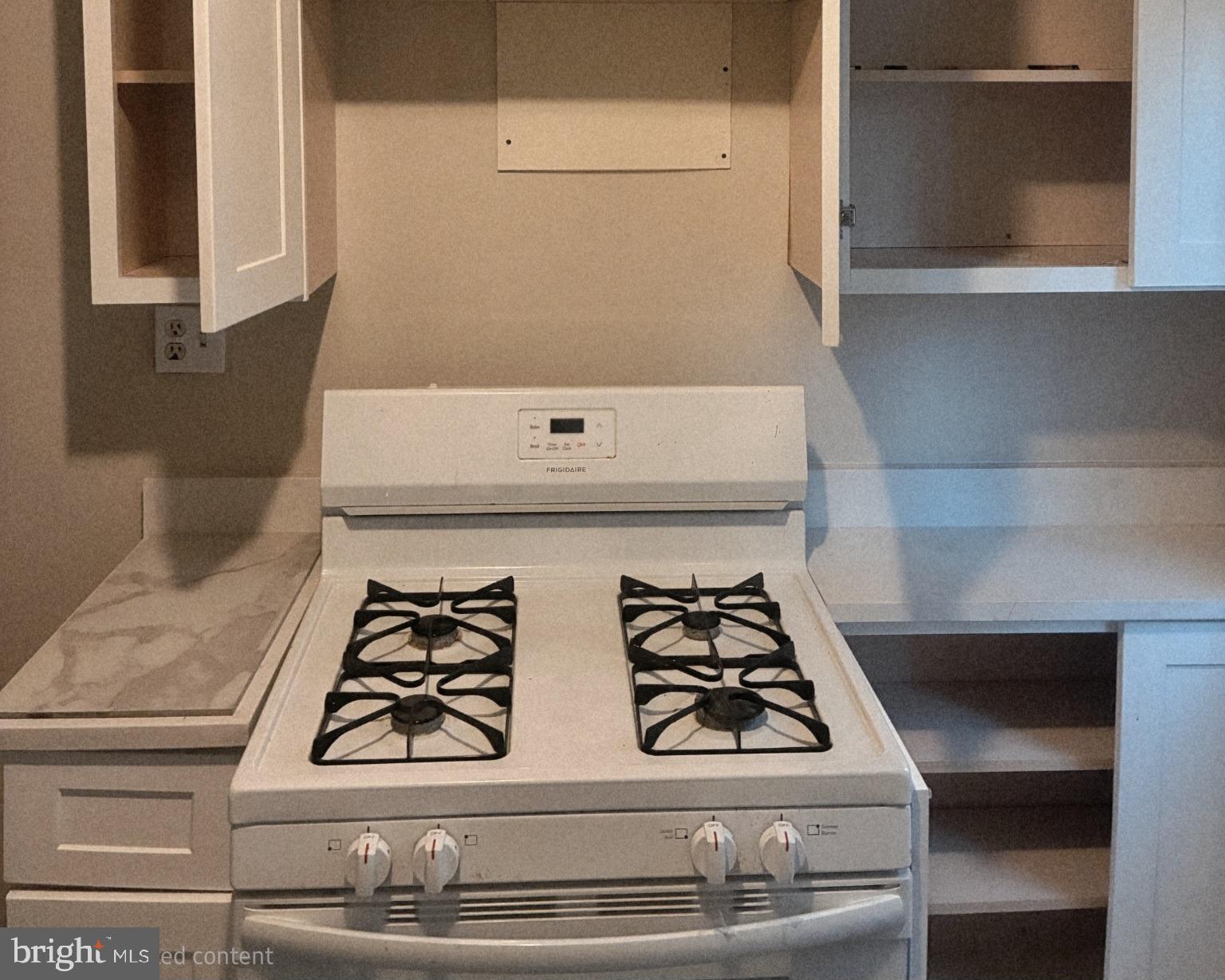 214 2nd Street Southeast Washington, DC 20003 - Photo 4 of 12 a stove top oven sitting inside of a kitchen
