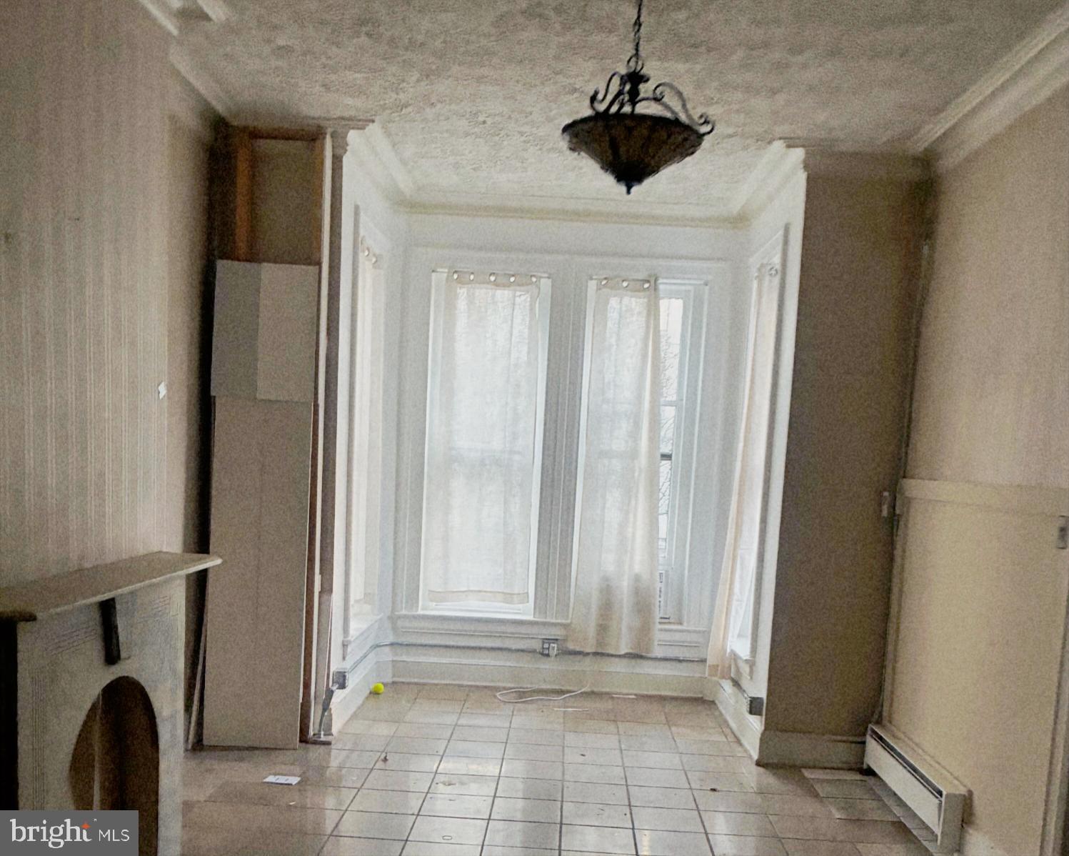 214 2nd Street Southeast Washington, DC 20003 - Photo 5 of 12 a view of entryway and hall with wooden floor