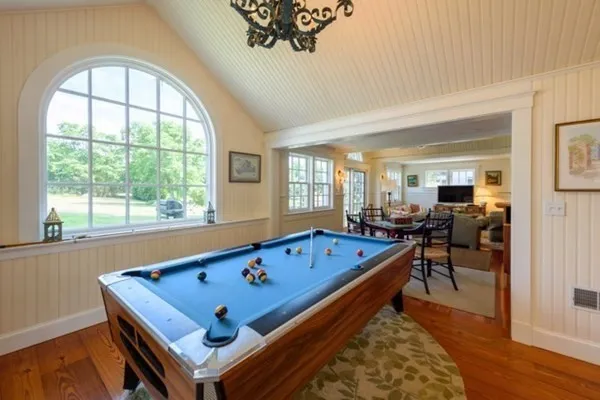 a very nice looking living room with a large window