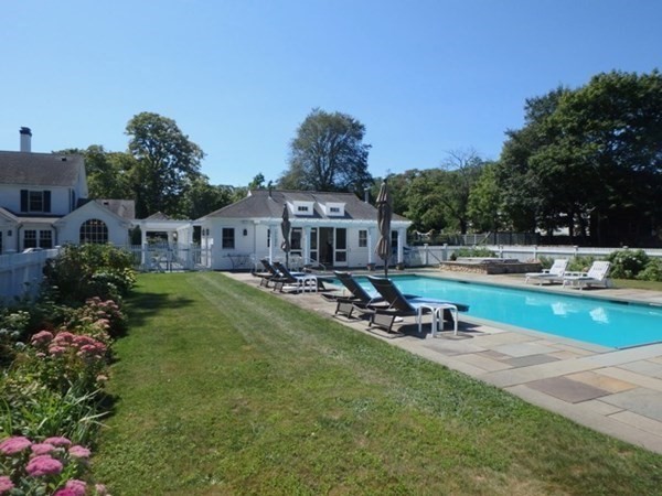 31 Lamberts Cove Road Tisbury, MA 02568 - Photo 33 of 35 a view of a house with backyard porch and sitting area