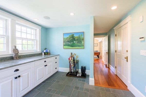 31 Lamberts Cove Road Tisbury, MA 02568 - Photo 4 of 35 a hallway with mirror and window