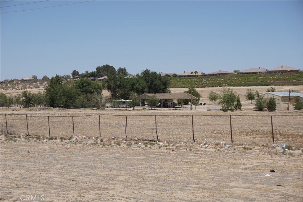 19968 Bear Valley Road Apple Valley, CA 92308 - Photo 7 of 20 a view of a yard