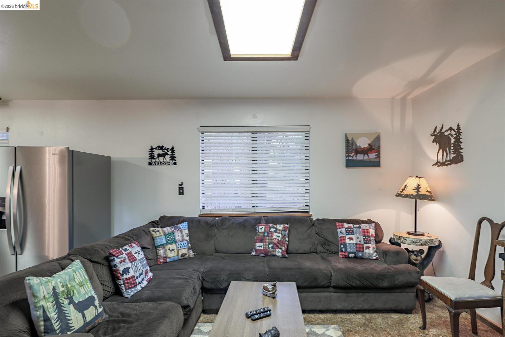 26600 Inyo Drive Cold Springs, CA 95335 - Photo 14 of 38 a living room with furniture and a couch