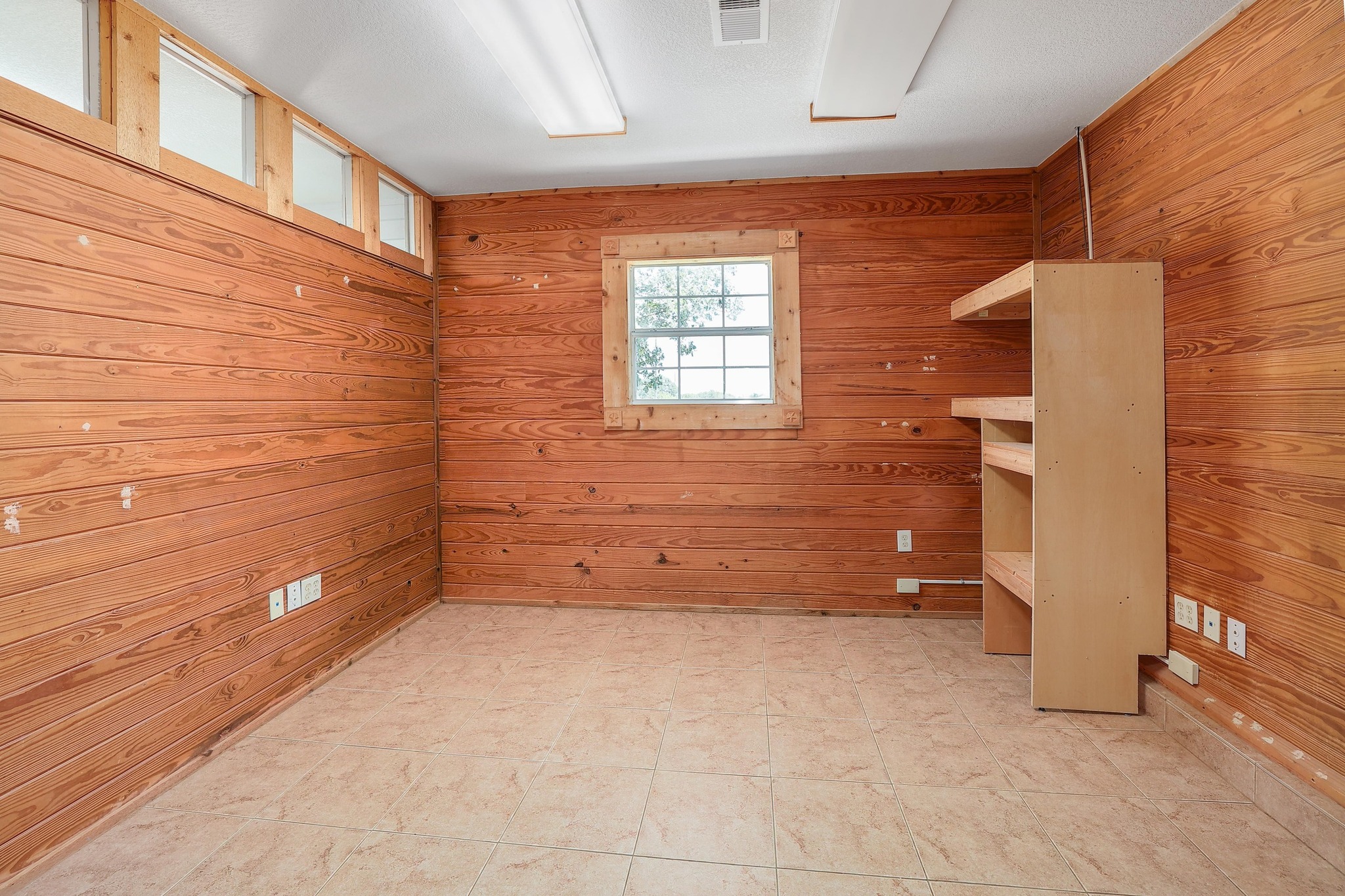 3900 Shell Road Georgetown, TX 78628 - Photo 34 of 40 Unfurnished room featuring wood walls