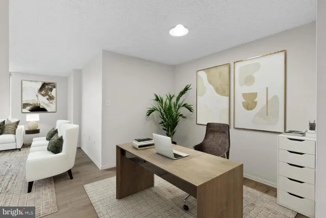 a bedroom with a bed and a cabinets