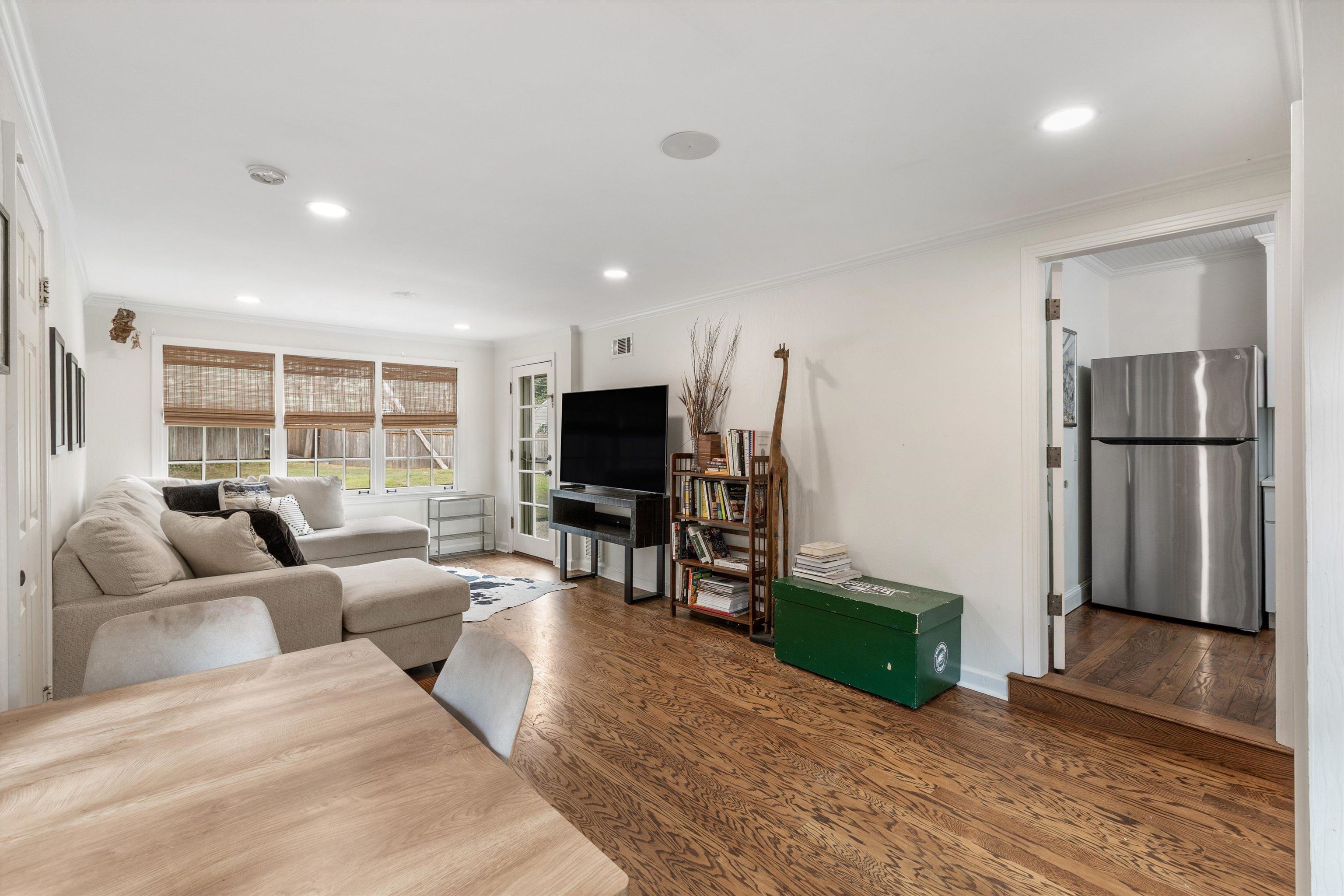 165 Picardy Street Memphis, TN 38111 - Photo 11 of 28 a living room with furniture and a flat screen tv