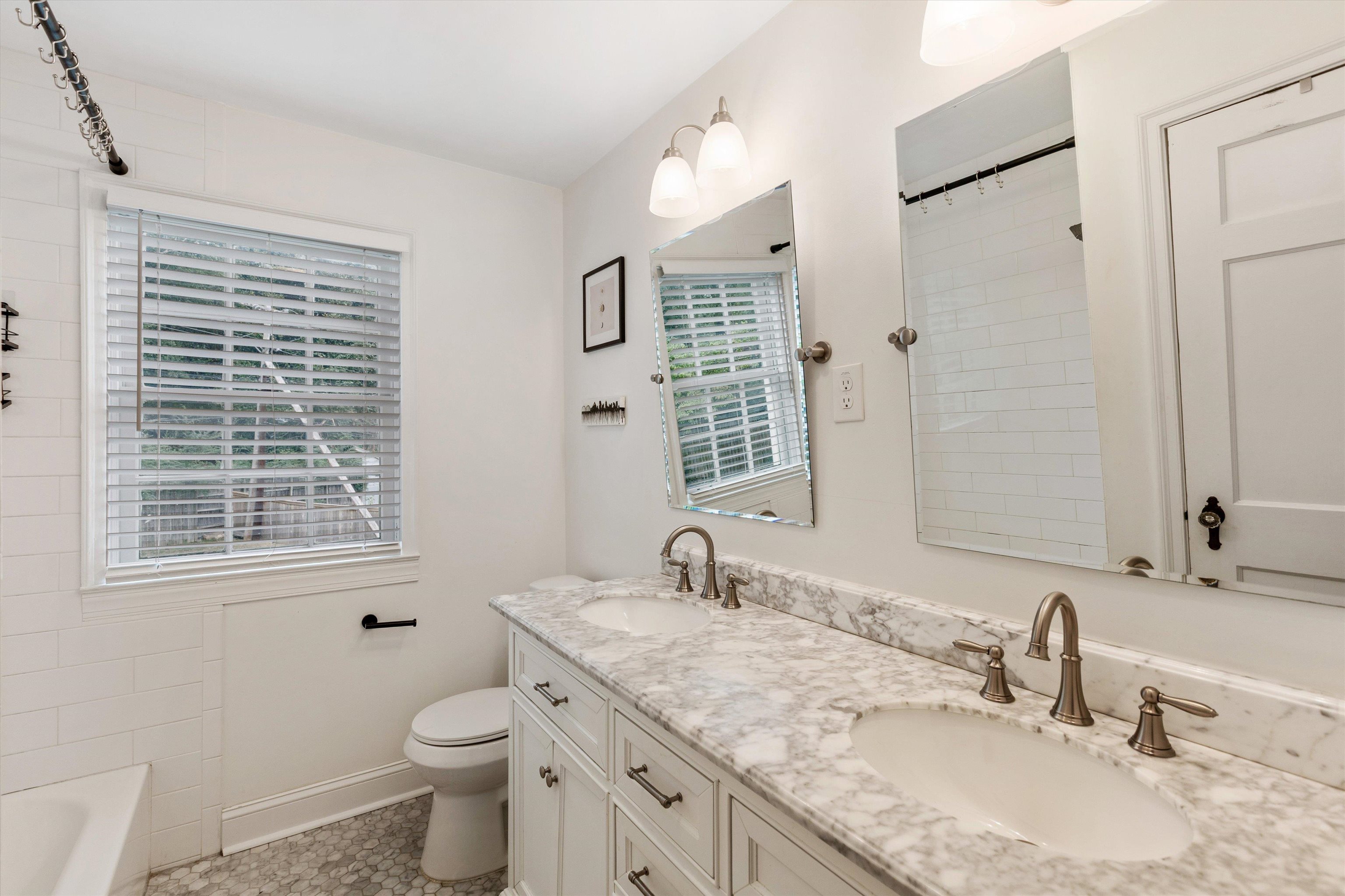 165 Picardy Street Memphis, TN 38111 - Photo 15 of 28 a bathroom with a granite countertop sink toilet and shower