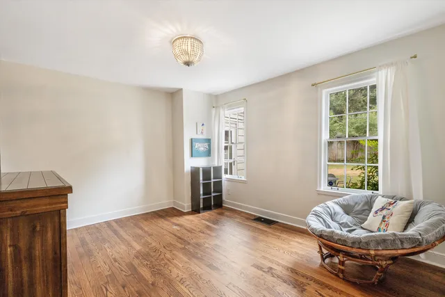 a workspace with furniture and a window