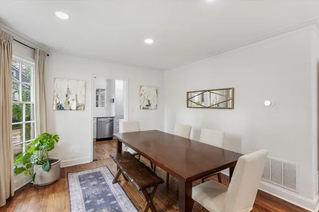 a kitchen with stainless steel appliances a stove microwave and cabinets