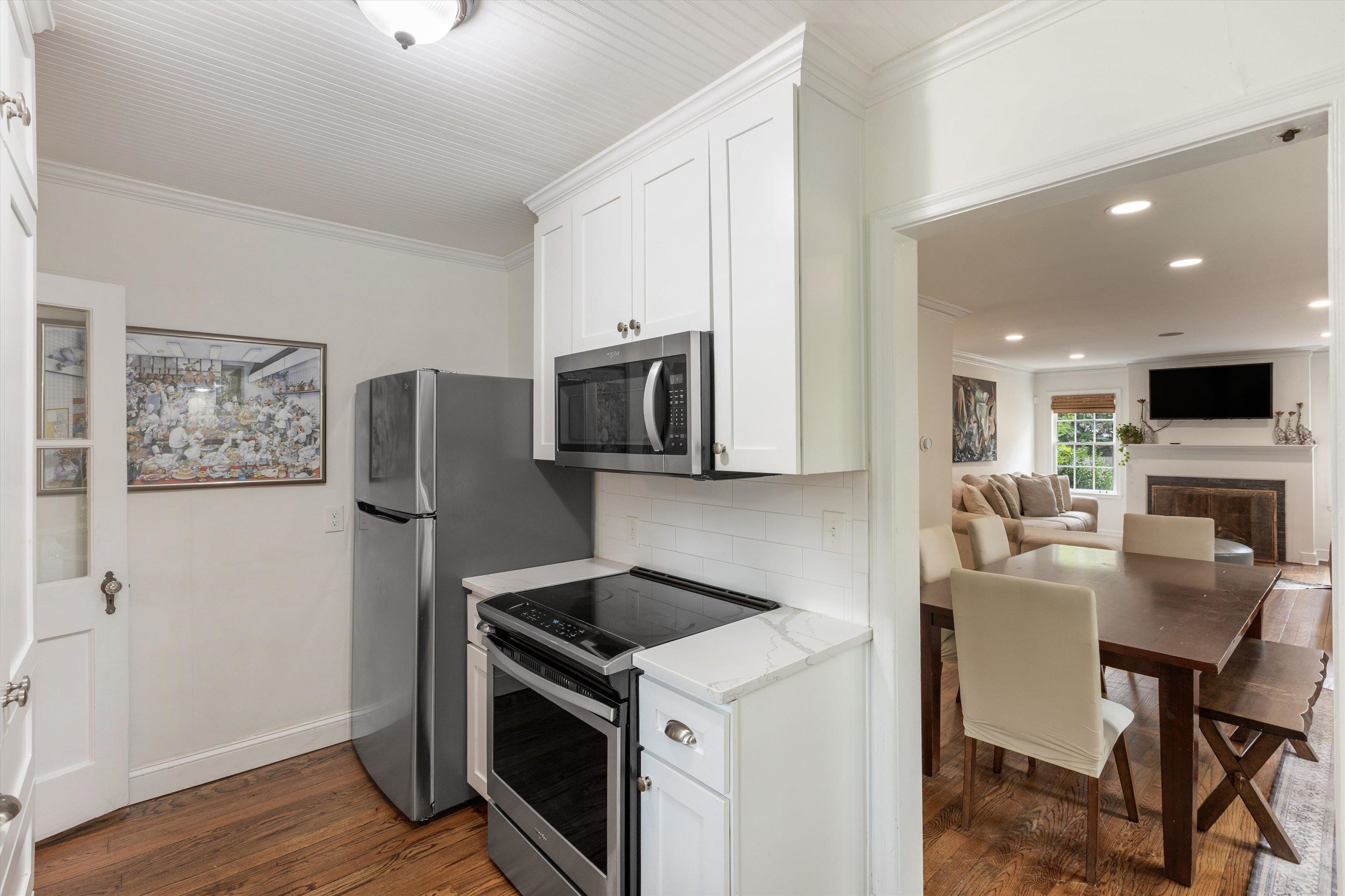165 Picardy Street Memphis, TN 38111 - Photo 9 of 28 a kitchen with stainless steel appliances a stove microwave and refrigerator
