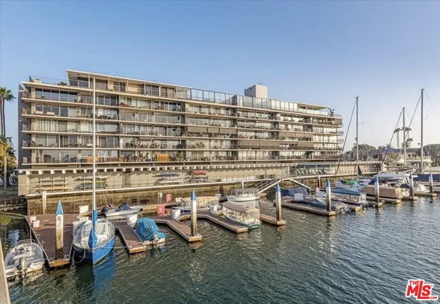 a view of a balcony with chairs