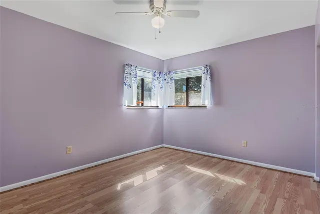 a house with trees in the background