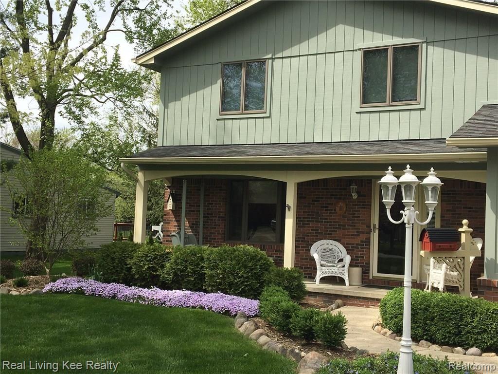 1880 Ruby Avenue Rochester, MI 48309 - Photo 2 of 37 What says Welcome Home more than this great front porch?