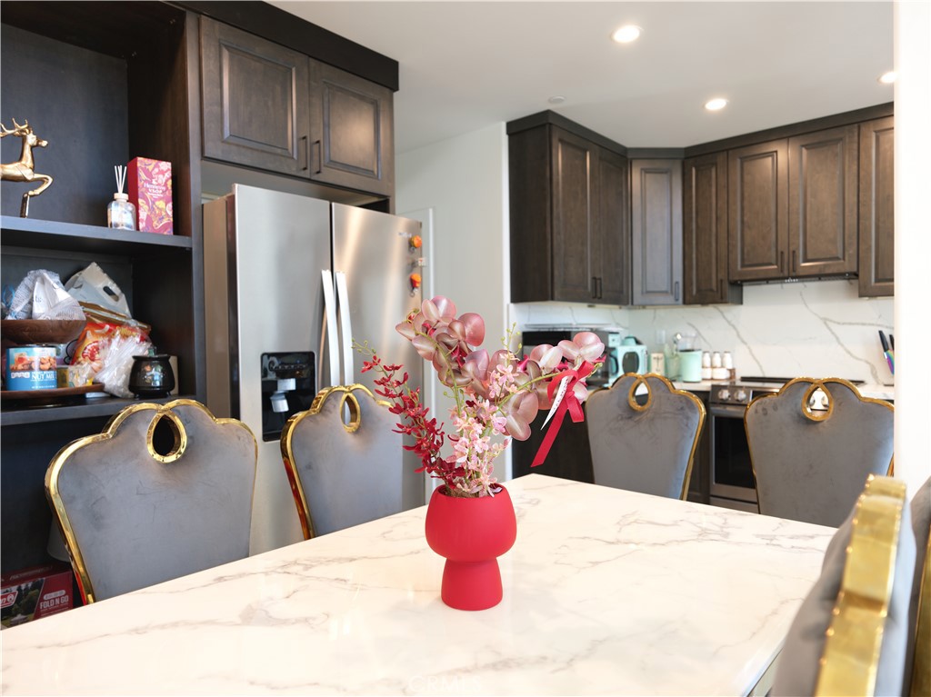 1670 Grass Valley Road Lake Arrowhead, CA 92352 - Photo 3 of 30 Kitchen Table and Refrigerator