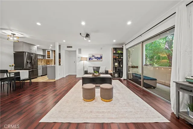 a view of a living room and dining room
