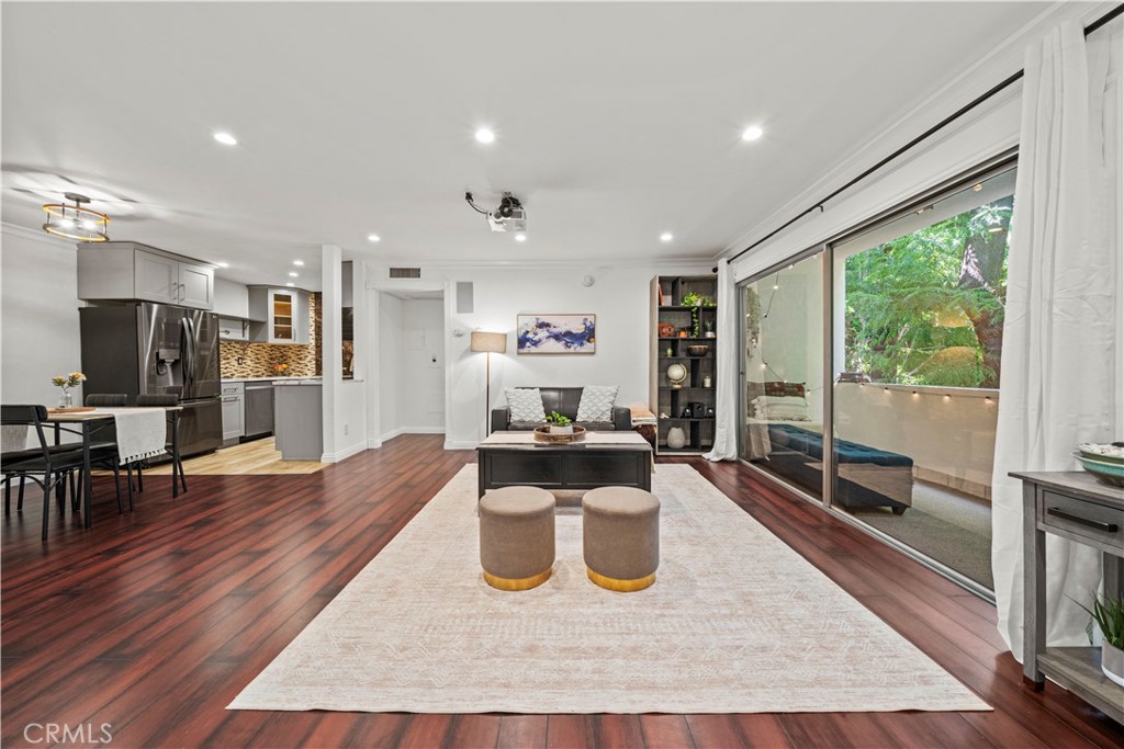 a view of a living room and dining room