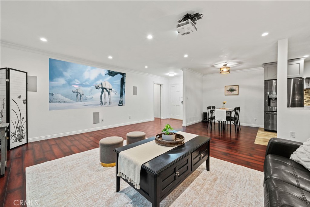 5215 Balboa Boulevard, Unit 203 Encino, CA 91316 - Photo 4 of 27 a living room with furniture and wooden floor