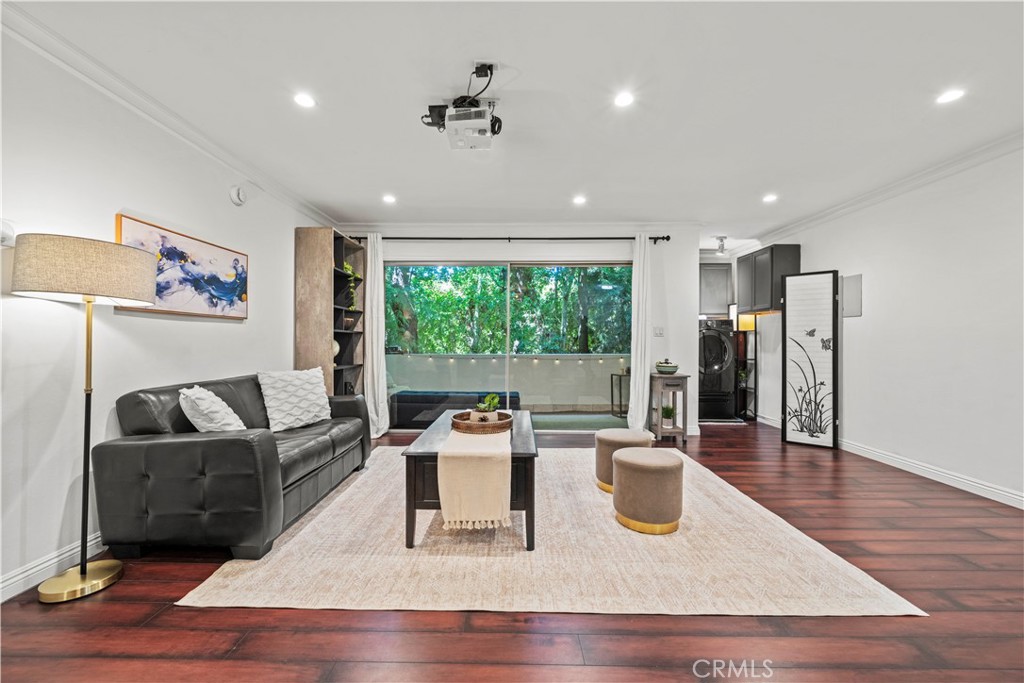 5215 Balboa Boulevard, Unit 203 Encino, CA 91316 - Photo 5 of 27 a living room with furniture and a large window