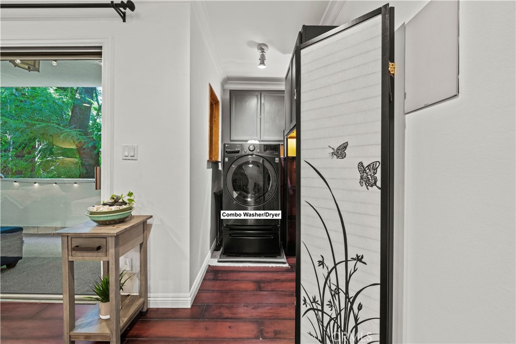 5215 Balboa Boulevard, Unit 203 Encino, CA 91316 - Photo 9 of 27 a utility room with a washer and dryer