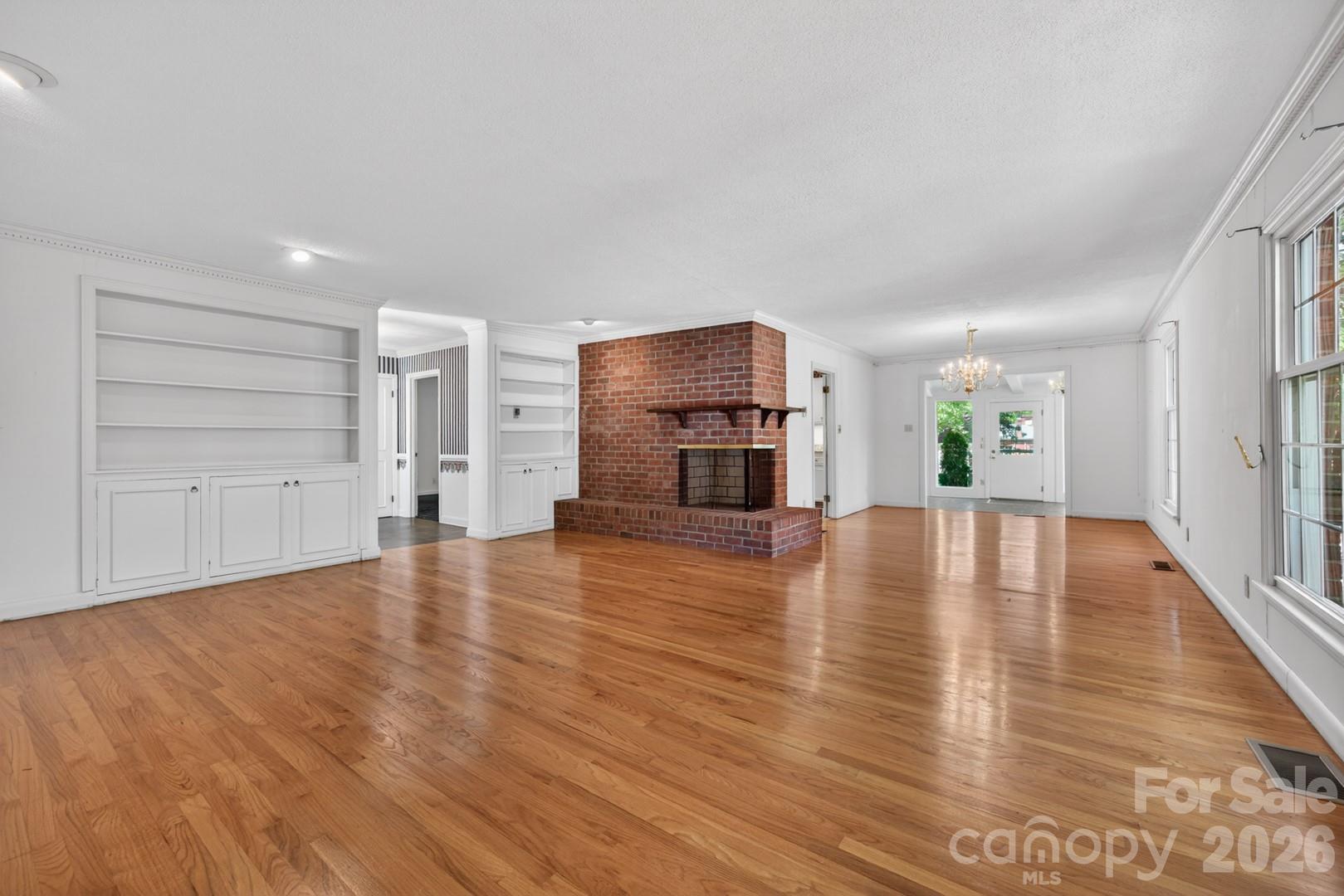 236 Richmond Road Salisbury, NC 28144 - Photo 11 of 48 a view of empty room with wooden floor and a window