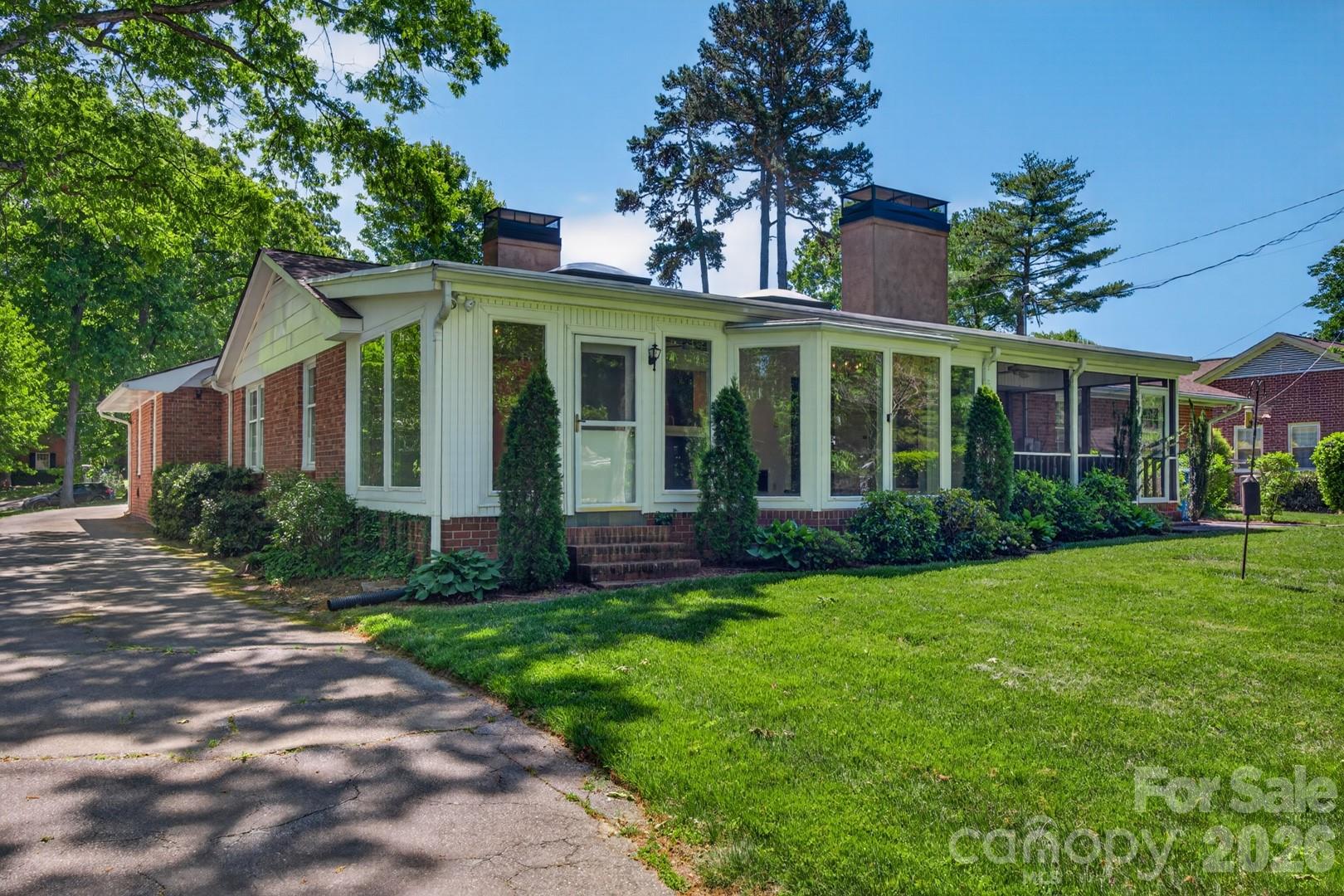 236 Richmond Road Salisbury, NC 28144 - Photo 34 of 48 a front view of a house with a garden and plants