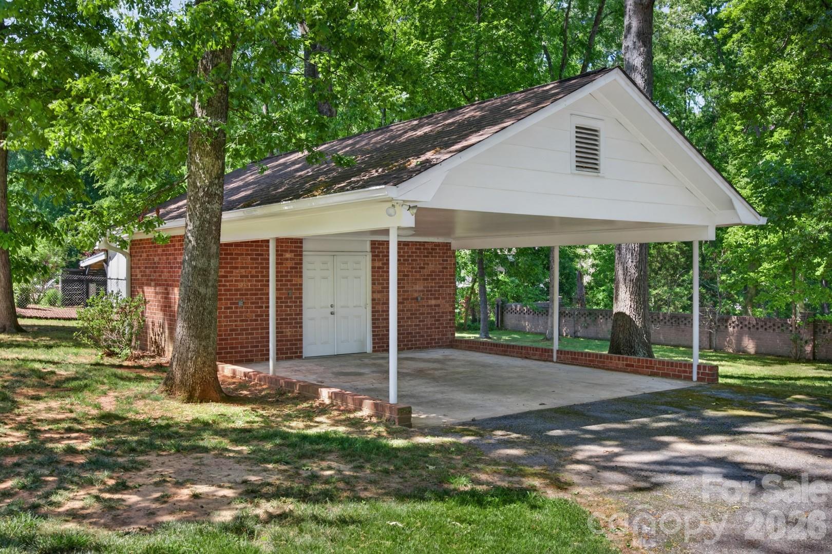 236 Richmond Road Salisbury, NC 28144 - Photo 35 of 48 a backyard of a house with barbeque oven