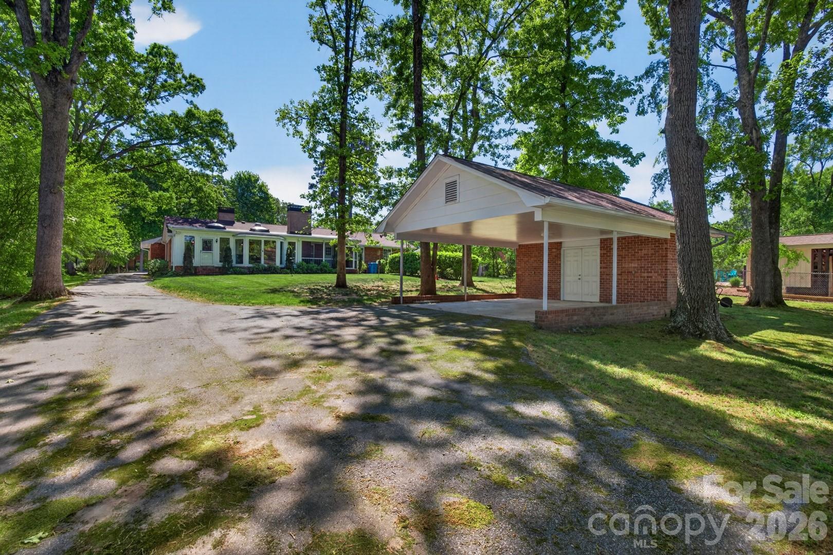 236 Richmond Road Salisbury, NC 28144 - Photo 36 of 48 a view of a house with a big yard and large trees