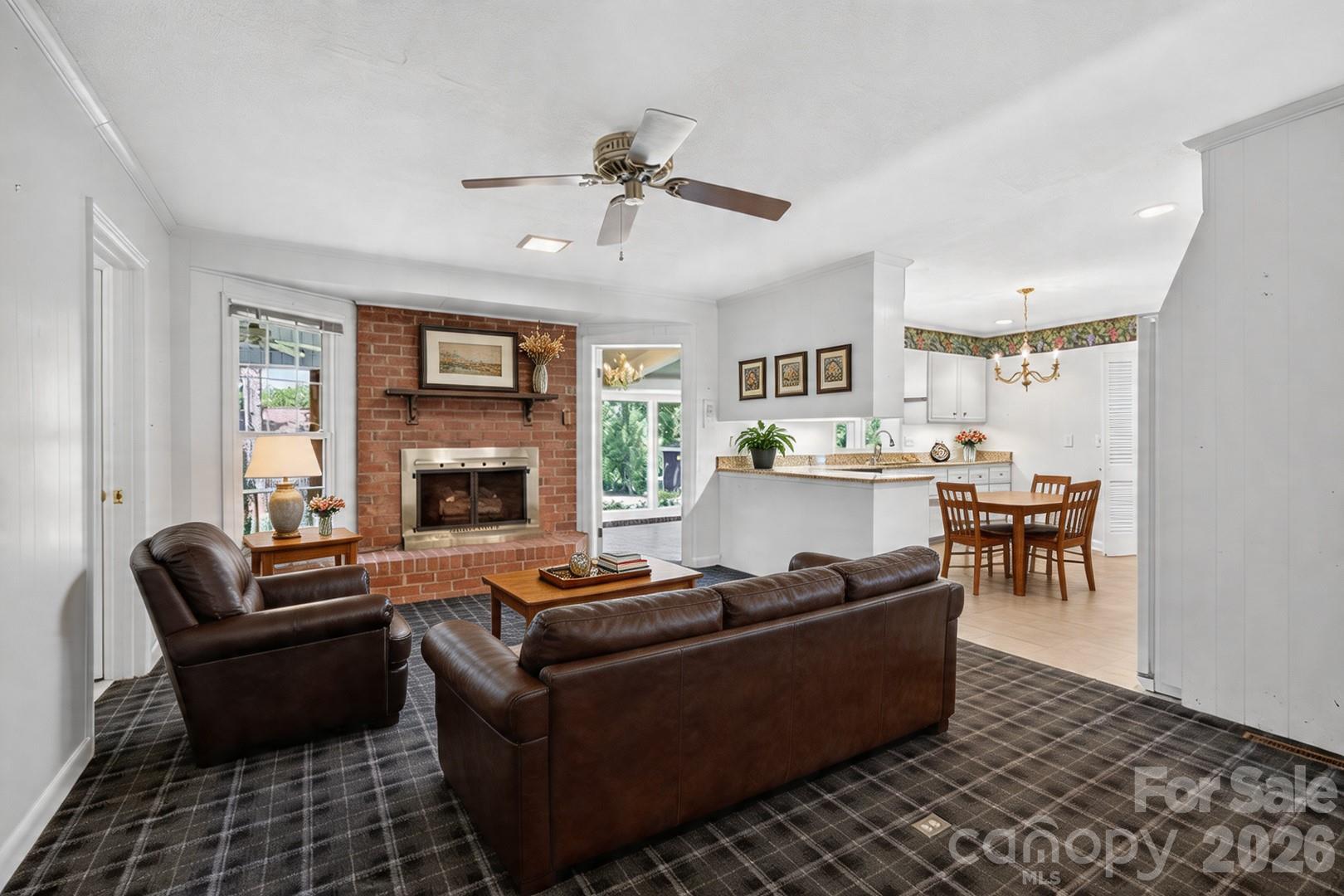 236 Richmond Road Salisbury, NC 28144 - Photo 7 of 48 a living room with furniture and a fireplace