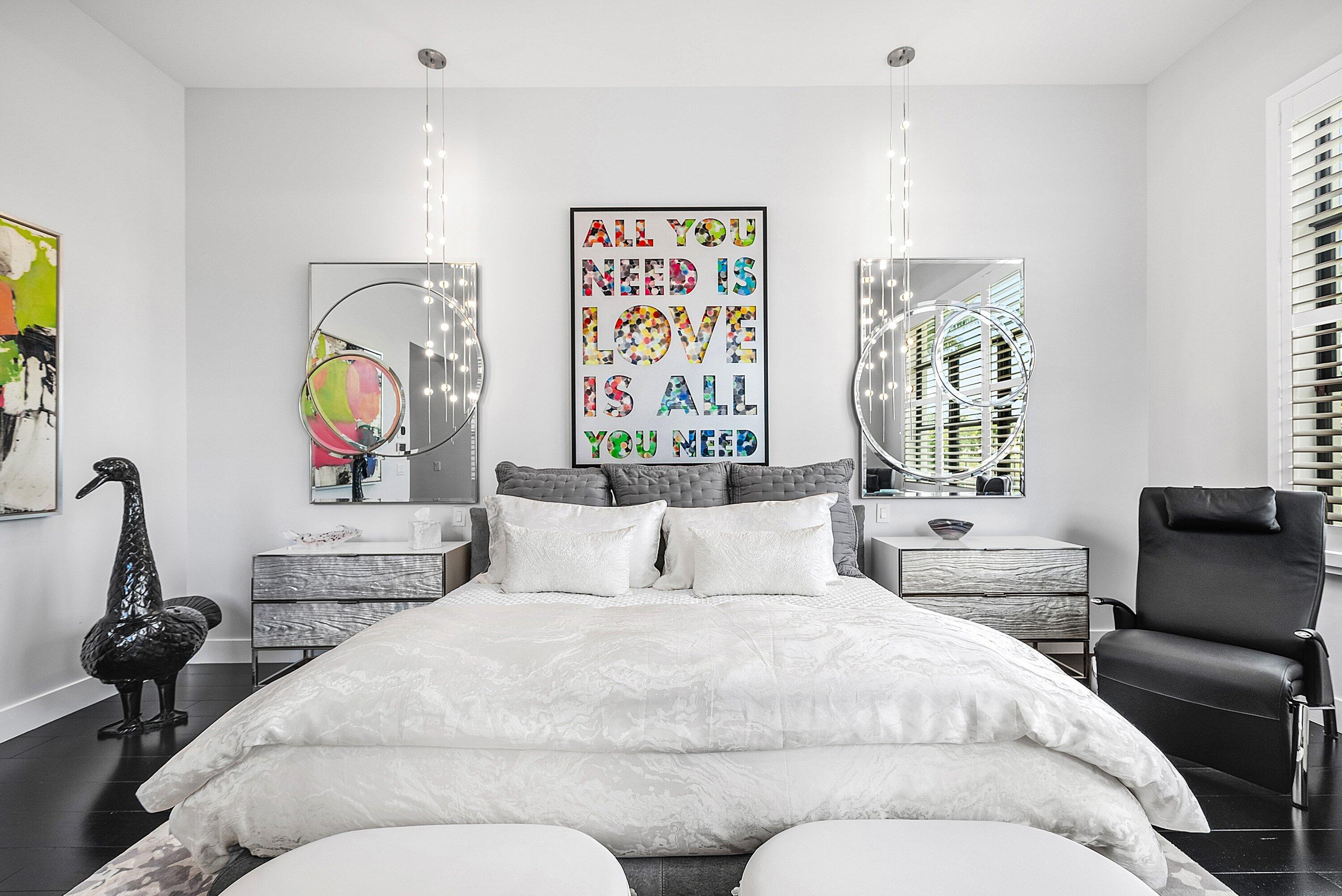 9569 Vescovato Way Boca Raton, FL 33496 - Photo 18 of 98 a bedroom with a bed and a lamp