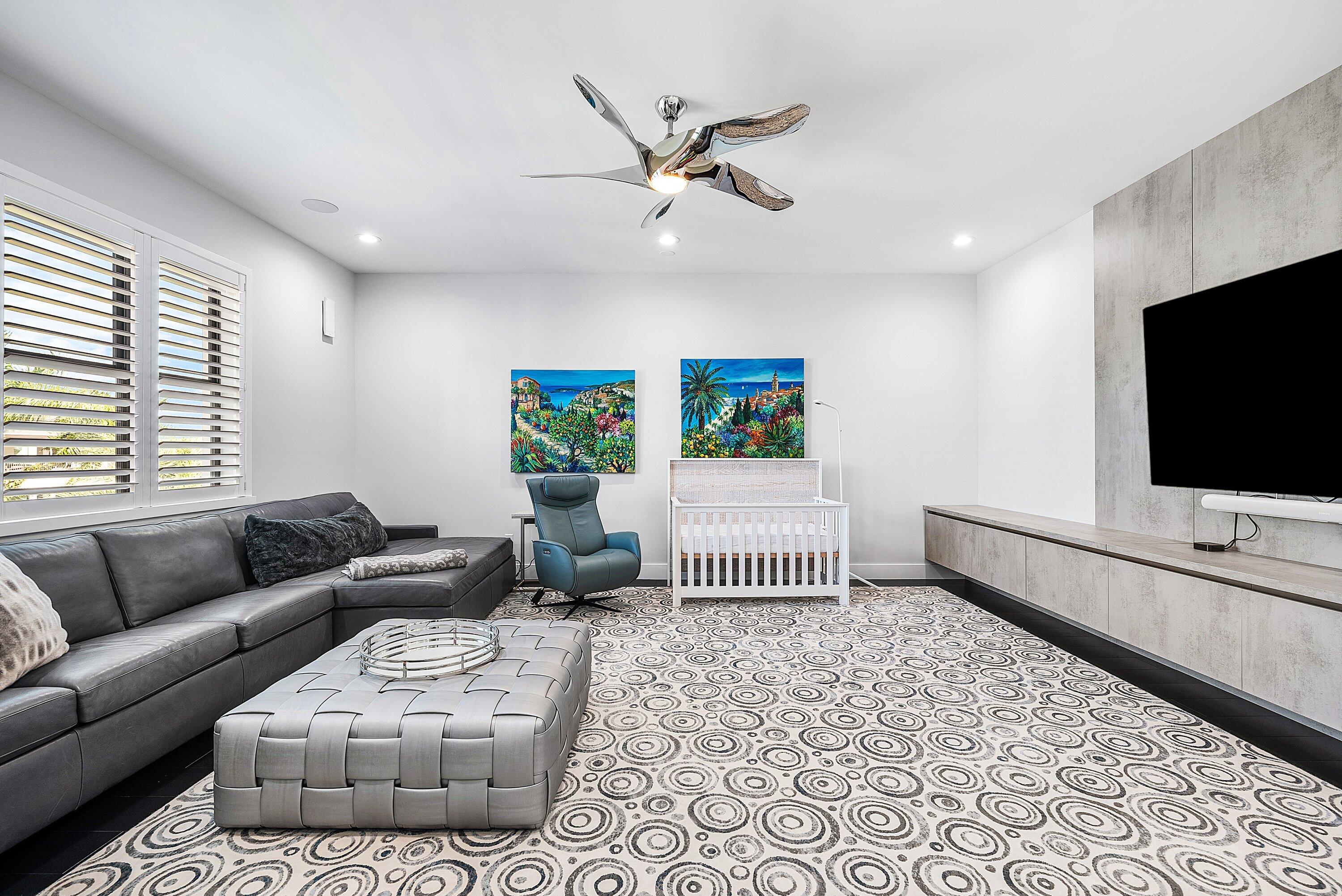 9569 Vescovato Way Boca Raton, FL 33496 - Photo 24 of 98 a living room with furniture and a flat screen tv