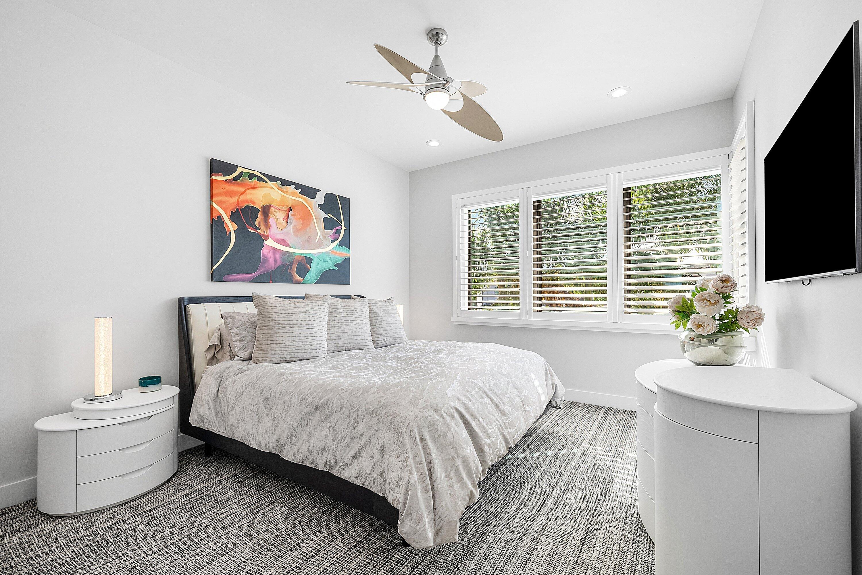 9569 Vescovato Way Boca Raton, FL 33496 - Photo 31 of 98 a bedroom with a bed and a flat screen tv