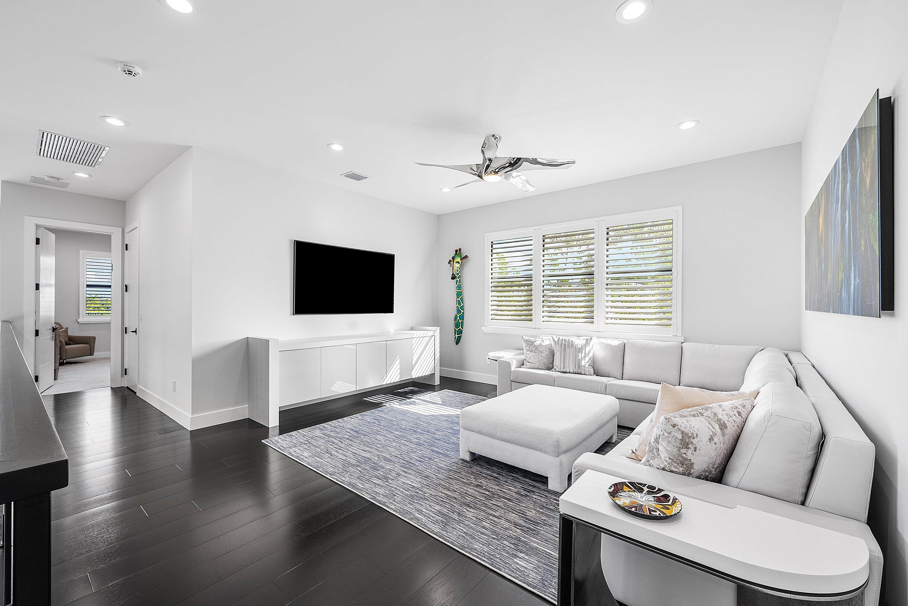 9569 Vescovato Way Boca Raton, FL 33496 - Photo 35 of 98 a living room with furniture and a flat screen tv