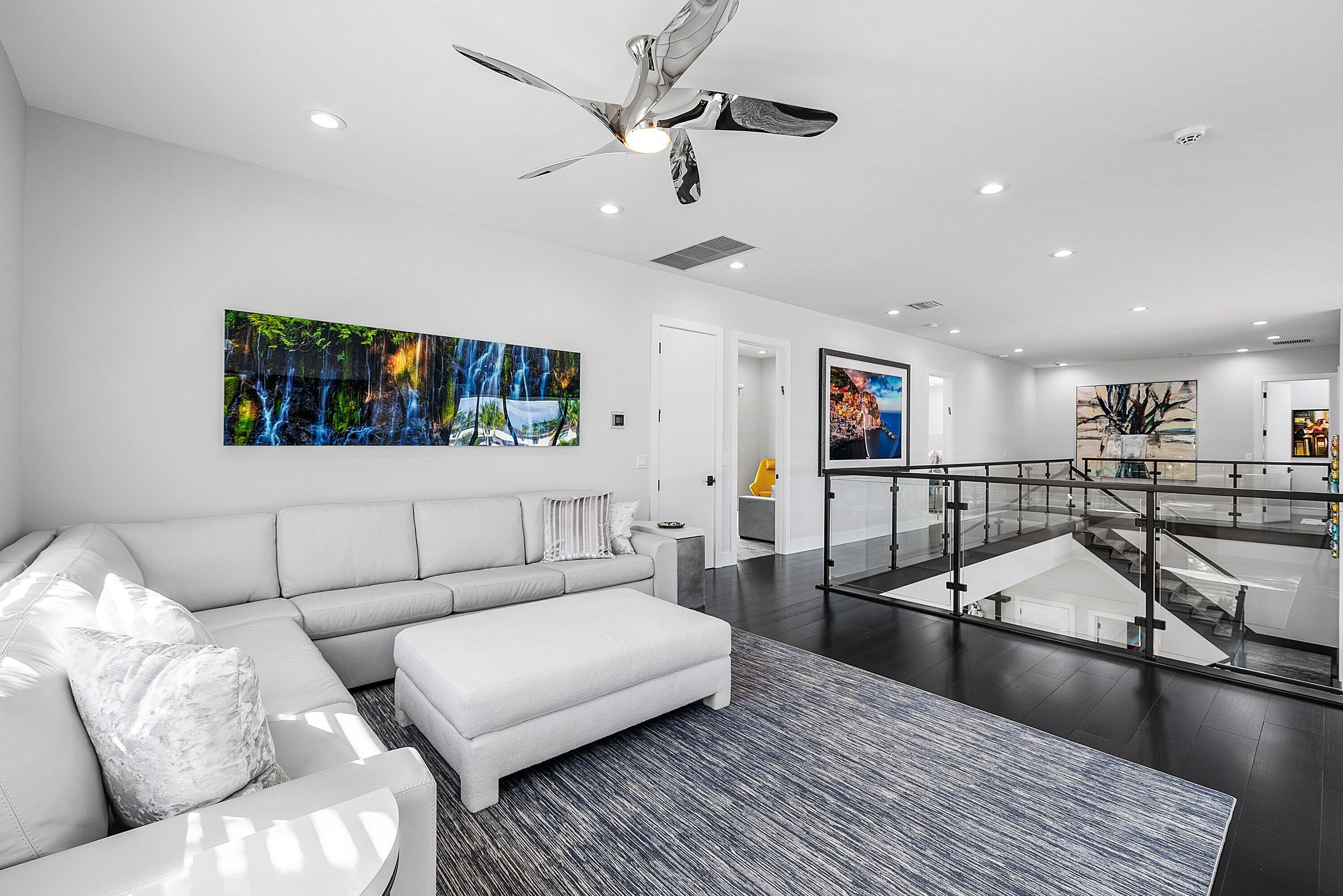 9569 Vescovato Way Boca Raton, FL 33496 - Photo 36 of 98 a living room with furniture and a flat screen tv