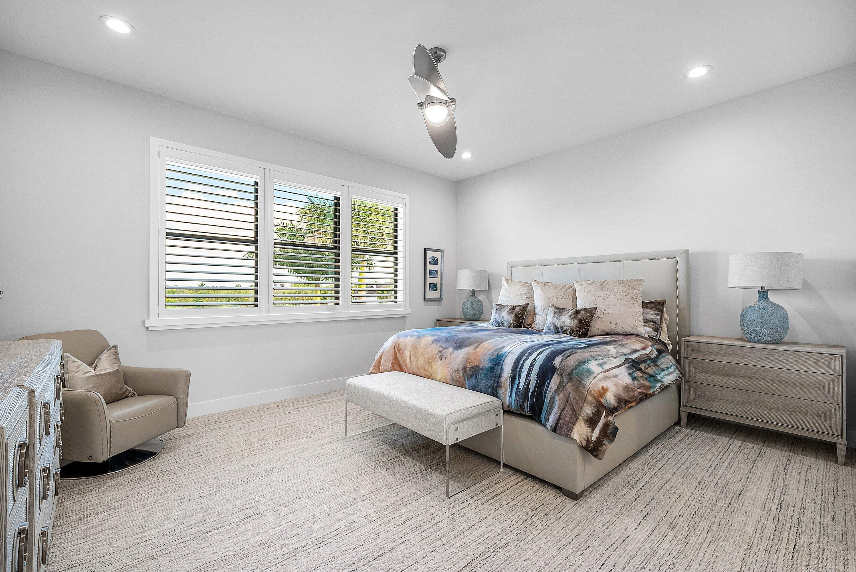 9569 Vescovato Way Boca Raton, FL 33496 - Photo 38 of 98 a bedroom with a bed and wooden floor