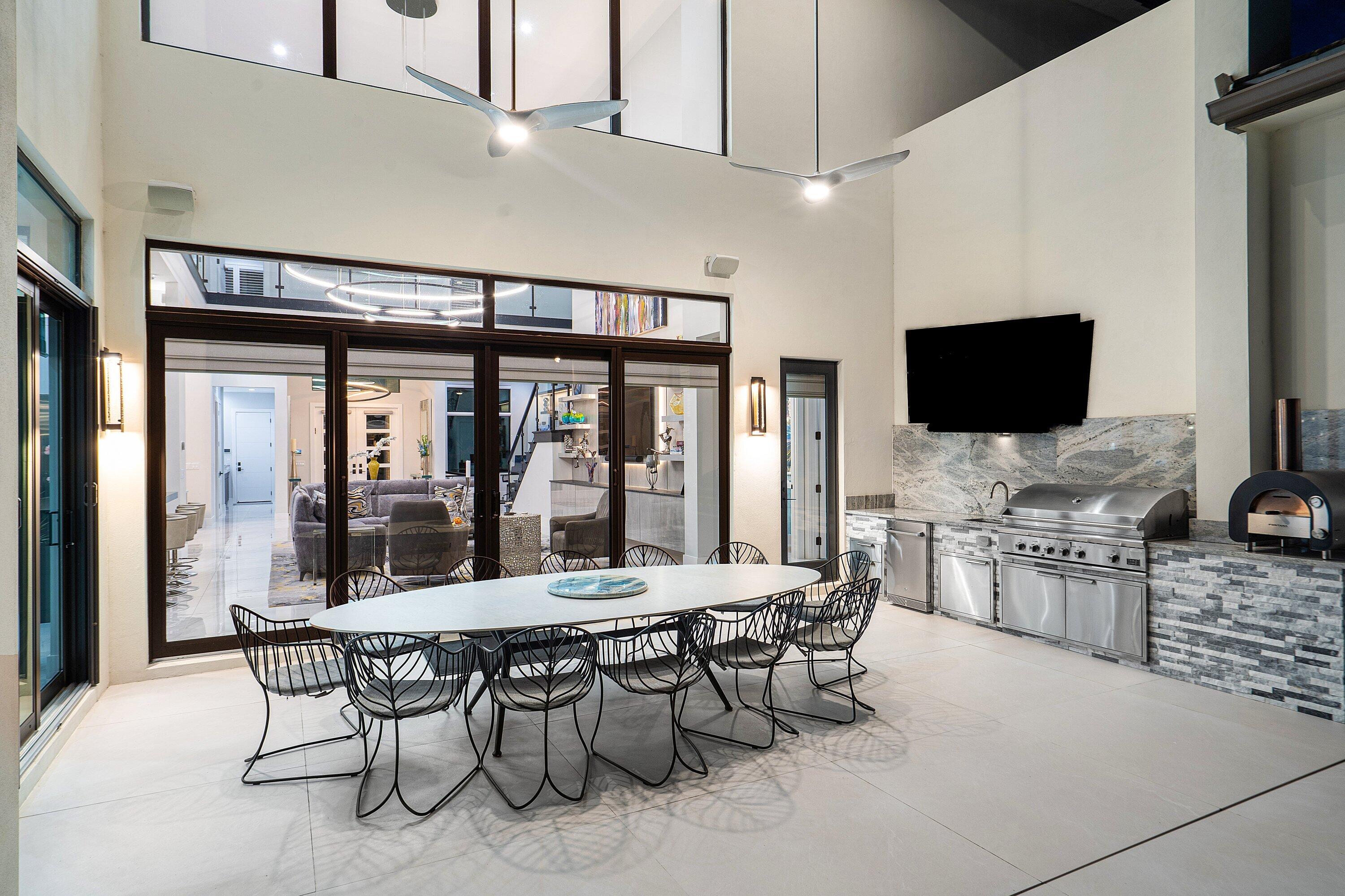 9569 Vescovato Way Boca Raton, FL 33496 - Photo 70 of 98 a view of a dining room with furniture window and outside view