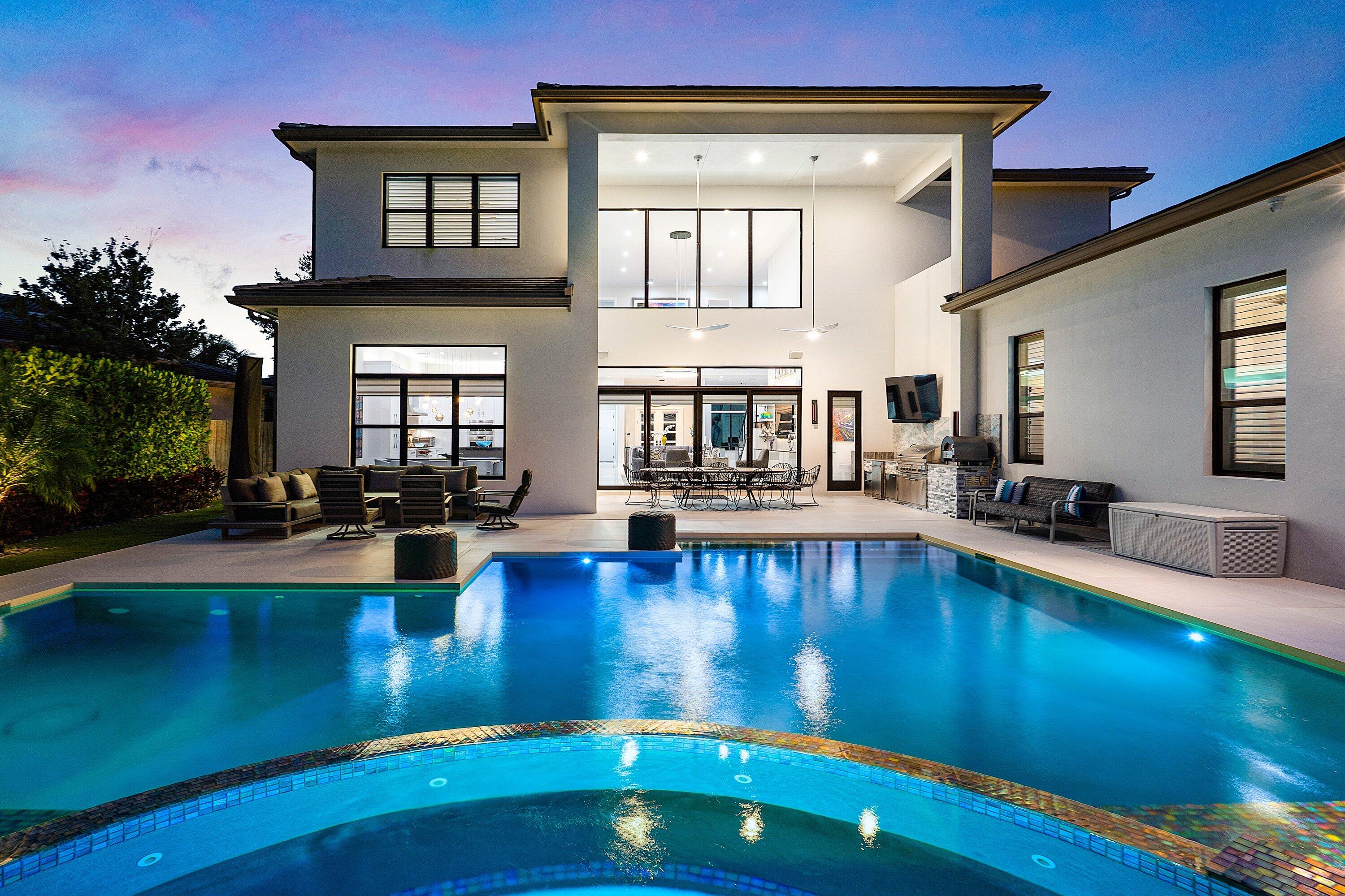 9569 Vescovato Way Boca Raton, FL 33496 - Photo 72 of 98 a view of a swimming pool with seating space