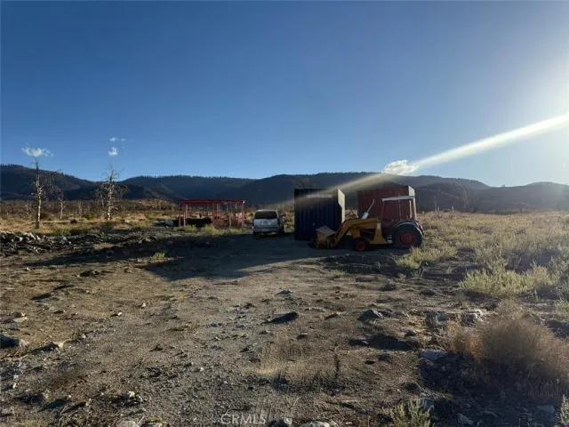 a view of backyard with outdoor space