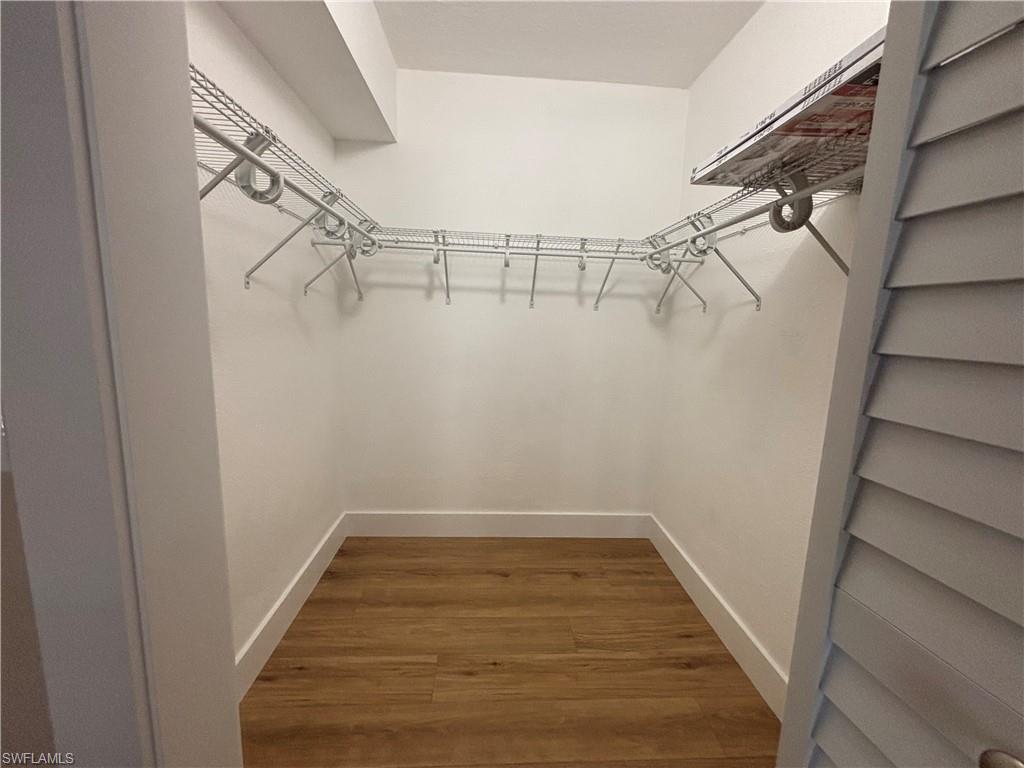 5305 Summerlin Road, Unit 501 Fort Myers, FL 33919 - Photo 6 of 10 a view of a room with racks on the wall