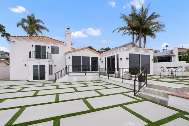 an empty room with wooden floor and a window