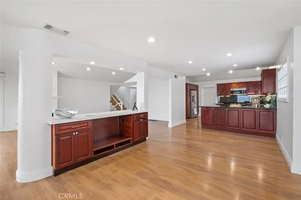 a view of a chairs and table in patio