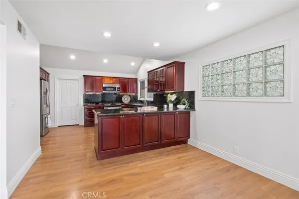 a view of a garden with houses